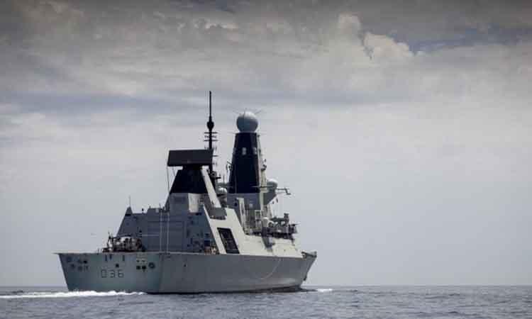 Russia summons UK envoy over warship intrusion