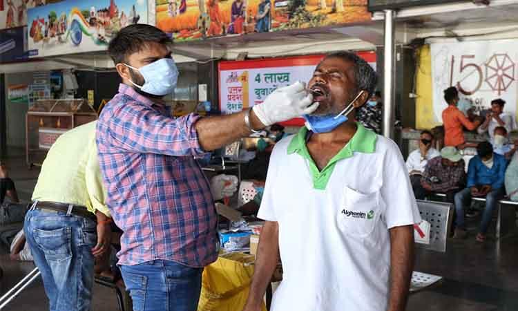 Health-worker-collecting-swab-testing