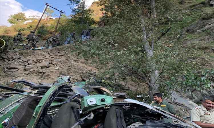 Police-inspecting-remains-crashed-helicopter