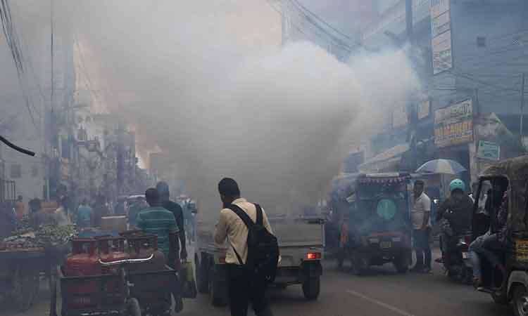 Municipal-workers-carry-fogging