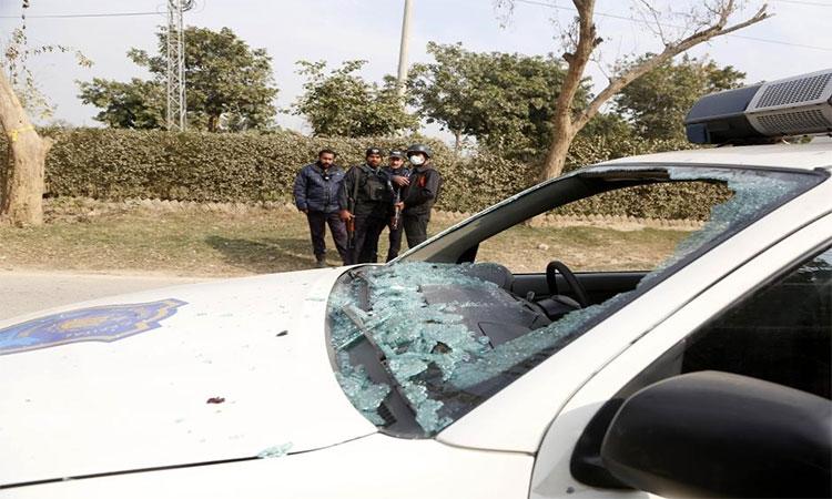A-police-car-is-damaged-in-a-suicide-attack-in-Pakistan