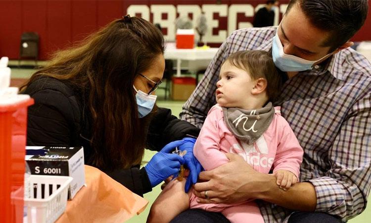 A-child-receives-a-COVID-19-vaccine-shot-in-Los-Angeles-the-United-States