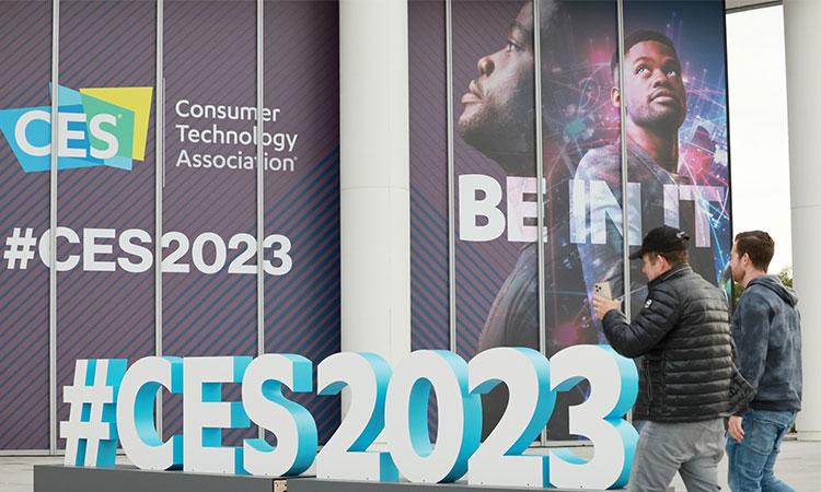 People-walk-past-an-installation-for-the-2023-Consumer-Electronics-Show-(CES)-in-Las-Vegas