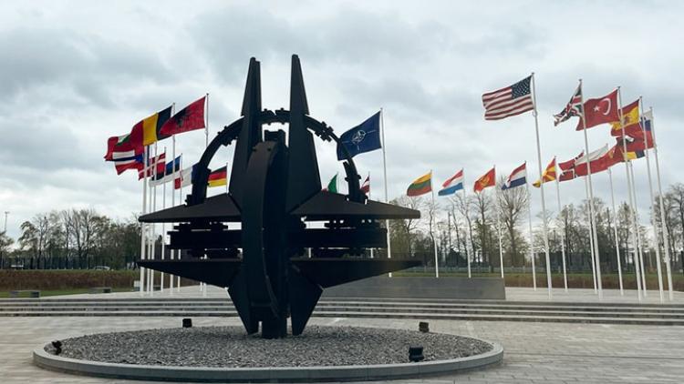 sculpture-and-flags-at-NATO-headquarters-in-Brussels-Belgium