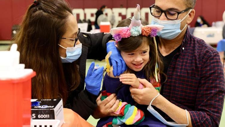 A-child-receives-a-COVID-19-vaccine-shot-in-Los-Angeles-the-United-States