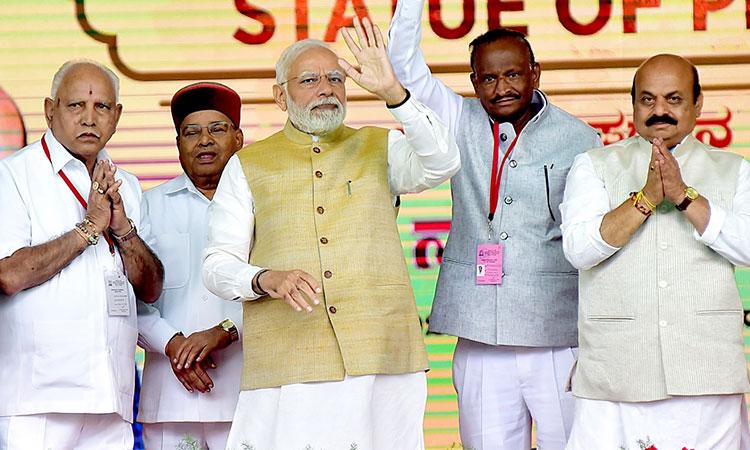 Prime-Minister-Narendra-Modi-with-Karnataka-CM-Basavaraj-Bommai-BJP-senior-leader-B-S-Yediyurappa-and-others-during a-public-meeting-in-Bengaluru