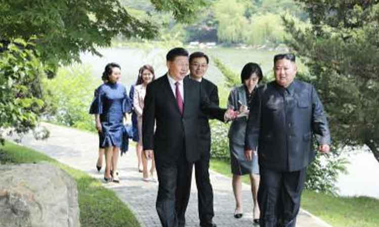 China-president-with-kim-jung-un