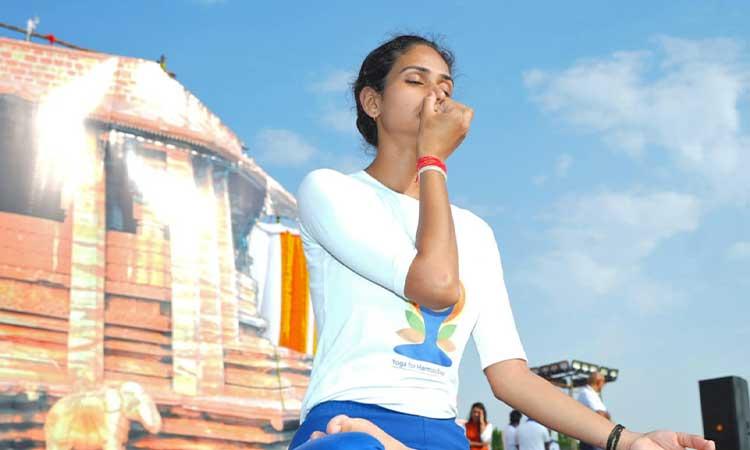Hyderabad:-A-Yoga-Instructor-performs-yoga-during-the-'Yoga-Mahotsav'