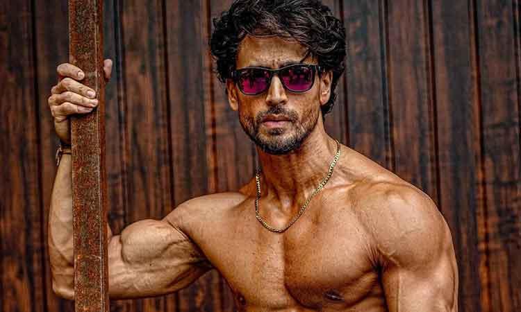 Tiger Shroff Flaunts His Six Pack Abs In Shirtless Photoshoot