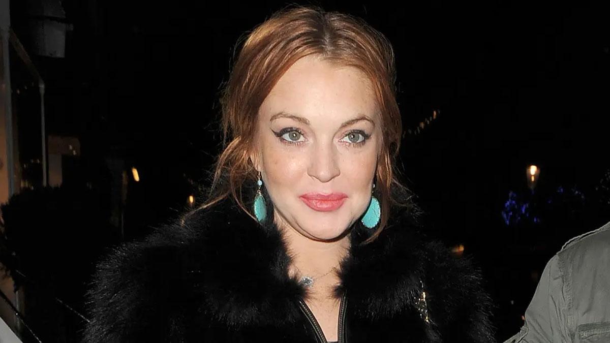 Lindsay Lohan Enjoys Leisurely Stroll with Husband and Newborn During Film Shoot