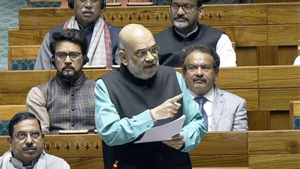 Home-Minister-Amit-Shah-speaks-in-the-Lok-Sabha-during-the-Budget-session-of-Parliament,-in-New-Delhi,-Saturday,-Feb.-10,-2024