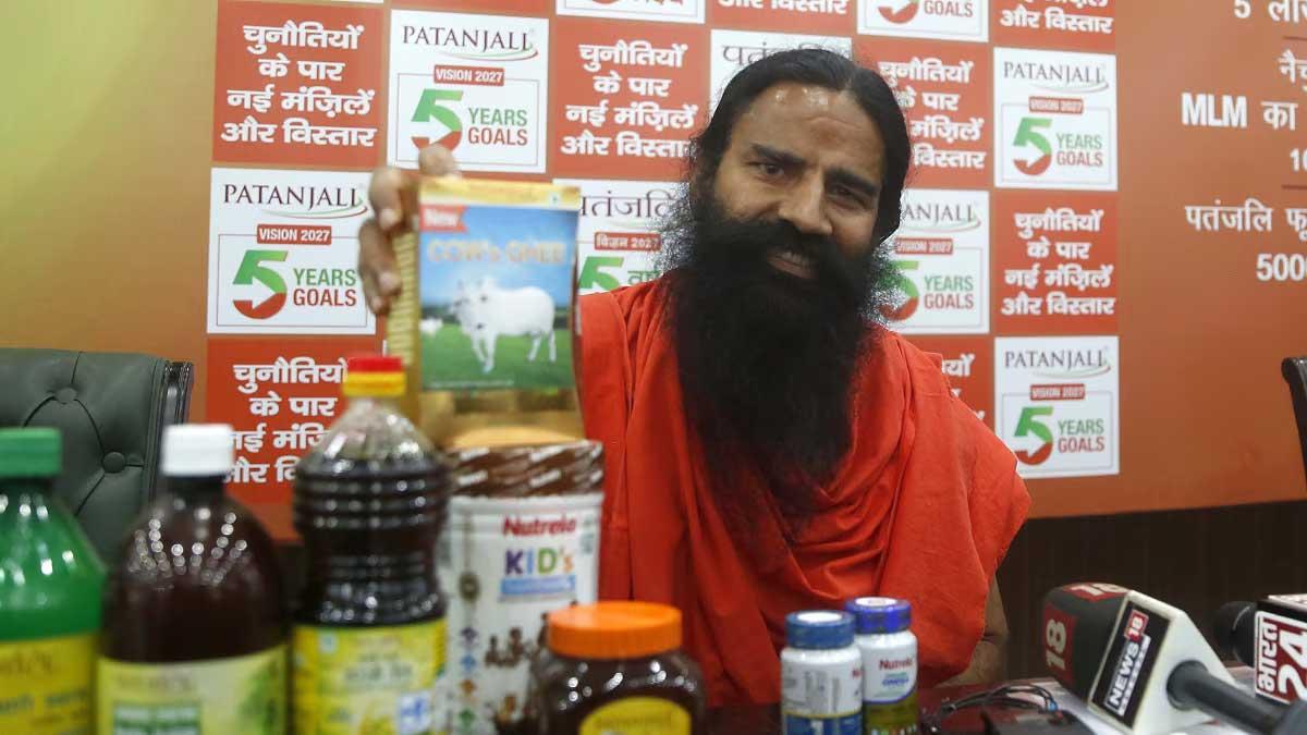 Yoga-Guru-and-Patanjali-Ayurved-co-founder-Ramdev-speaks-during-a-press-conference-in-New-Delhi.
