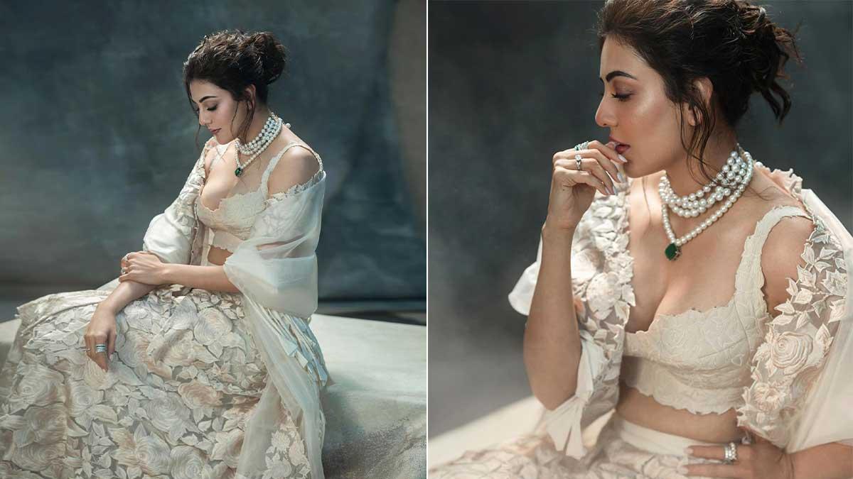 Kajal Aggarwal's Stunning Tribute to Grace and Elegance: A Swan-Inspired Ivory Lehenga Look